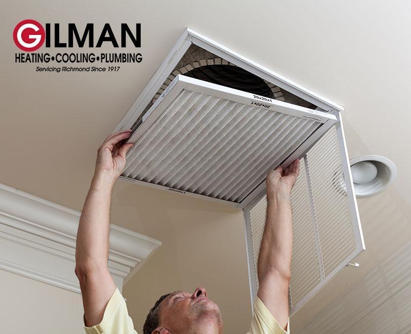 Gilman changing air filter-air conditioning
